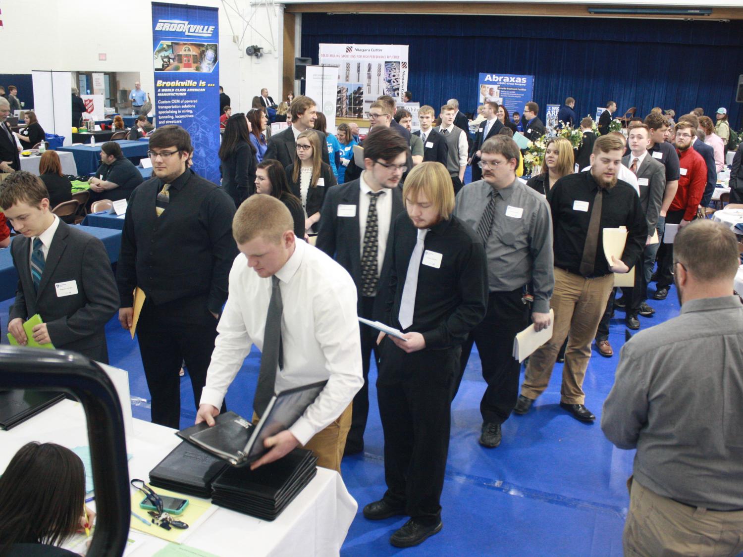 Jobseekers interact with employers during last year's career fair.  