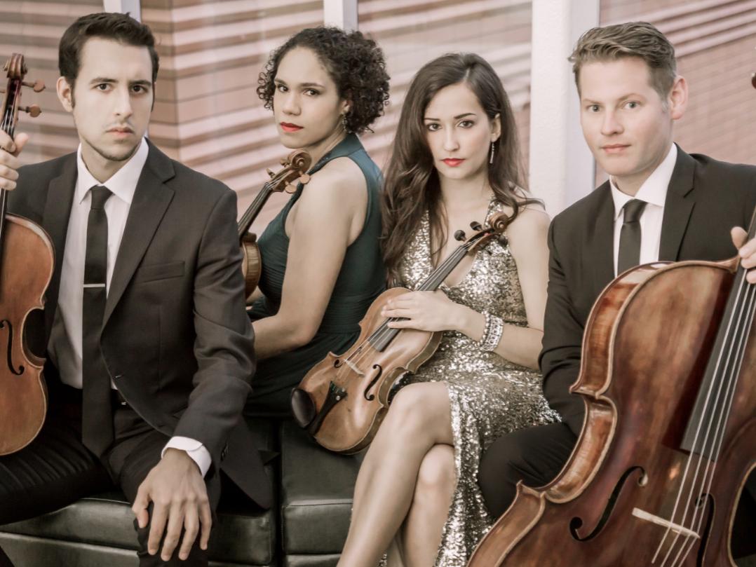 Catalyst Quartet members pose for the camera.