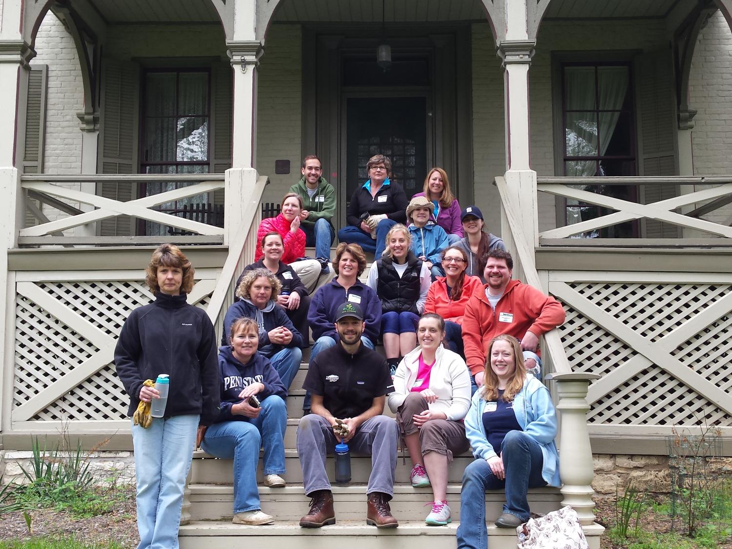 Student Affairs staff members posing on the steps of Centre Furnace Mansion