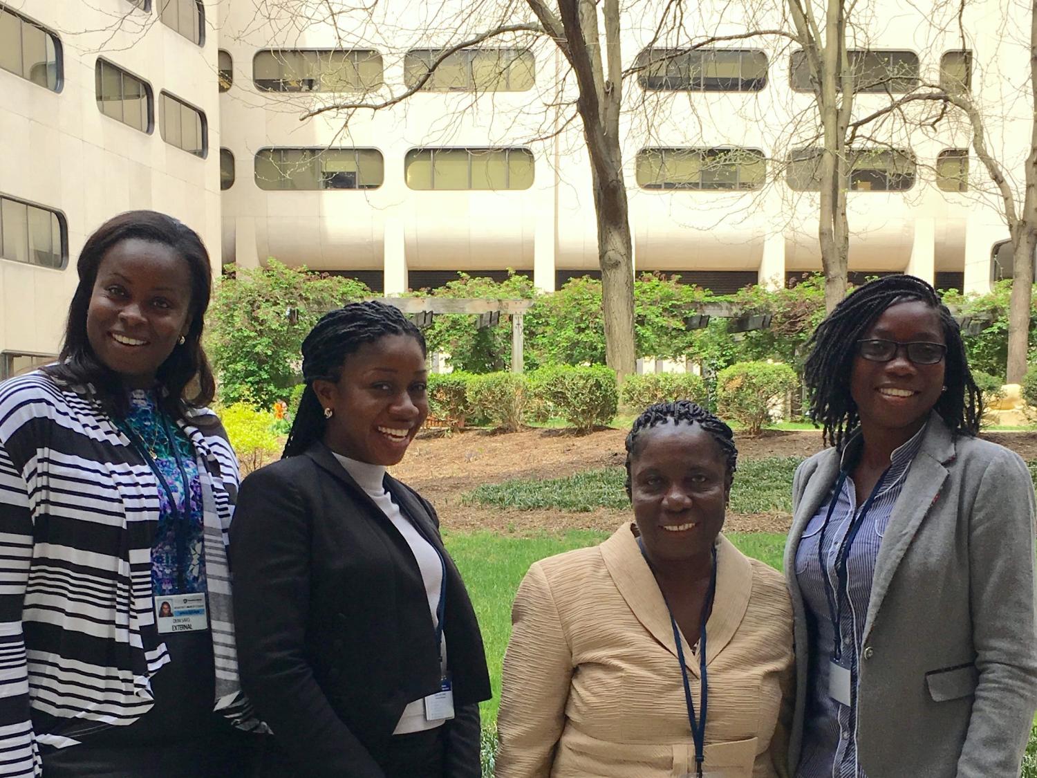 Four Mountcrest University College faculty from Ghana pose for a photo.