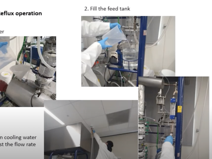 Screen capture of a video showing various early steps in a distillation experiment.