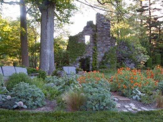 Stone wall and blooming garden at Chanticleer
