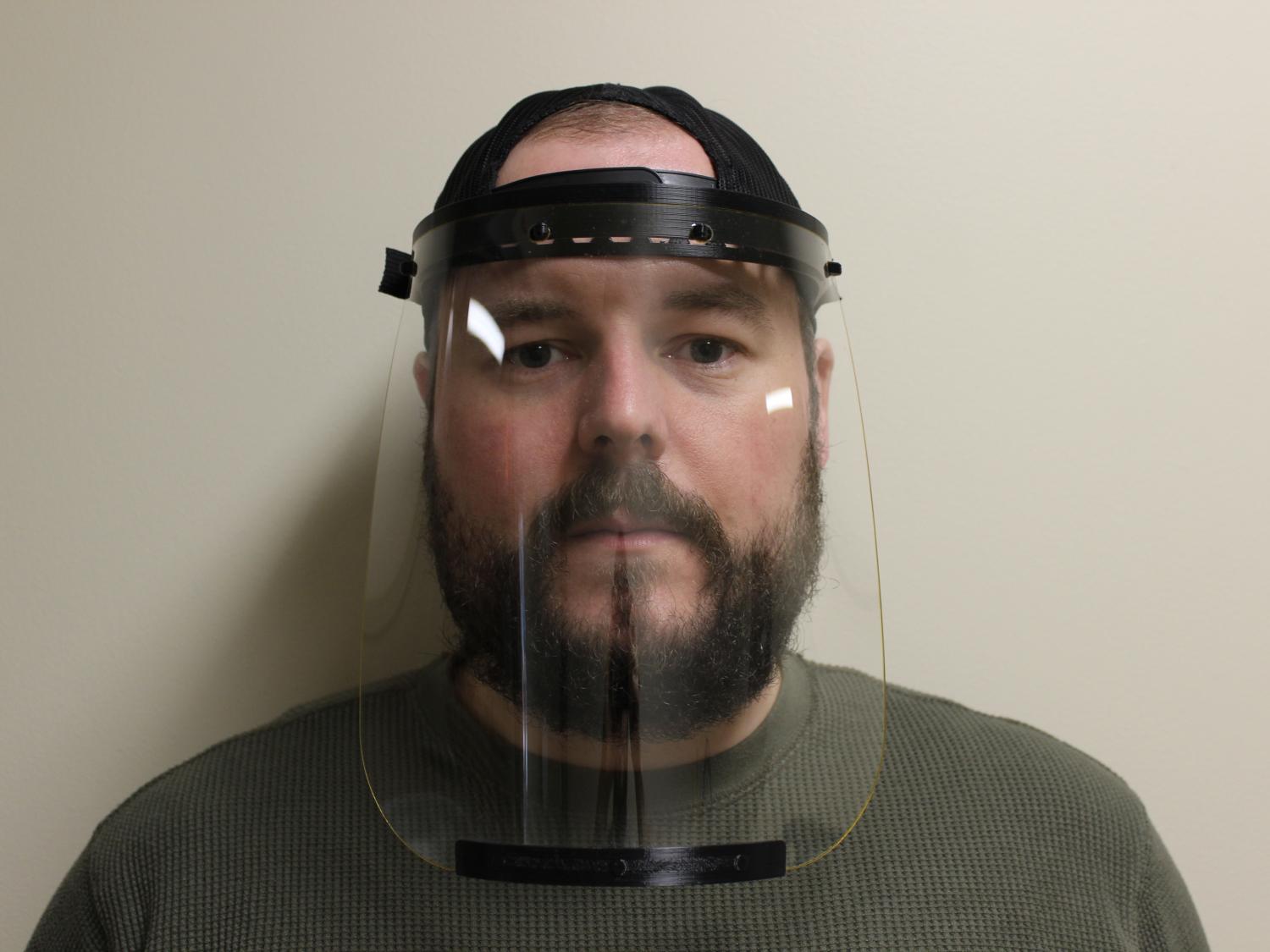 Man wearing a face shield
