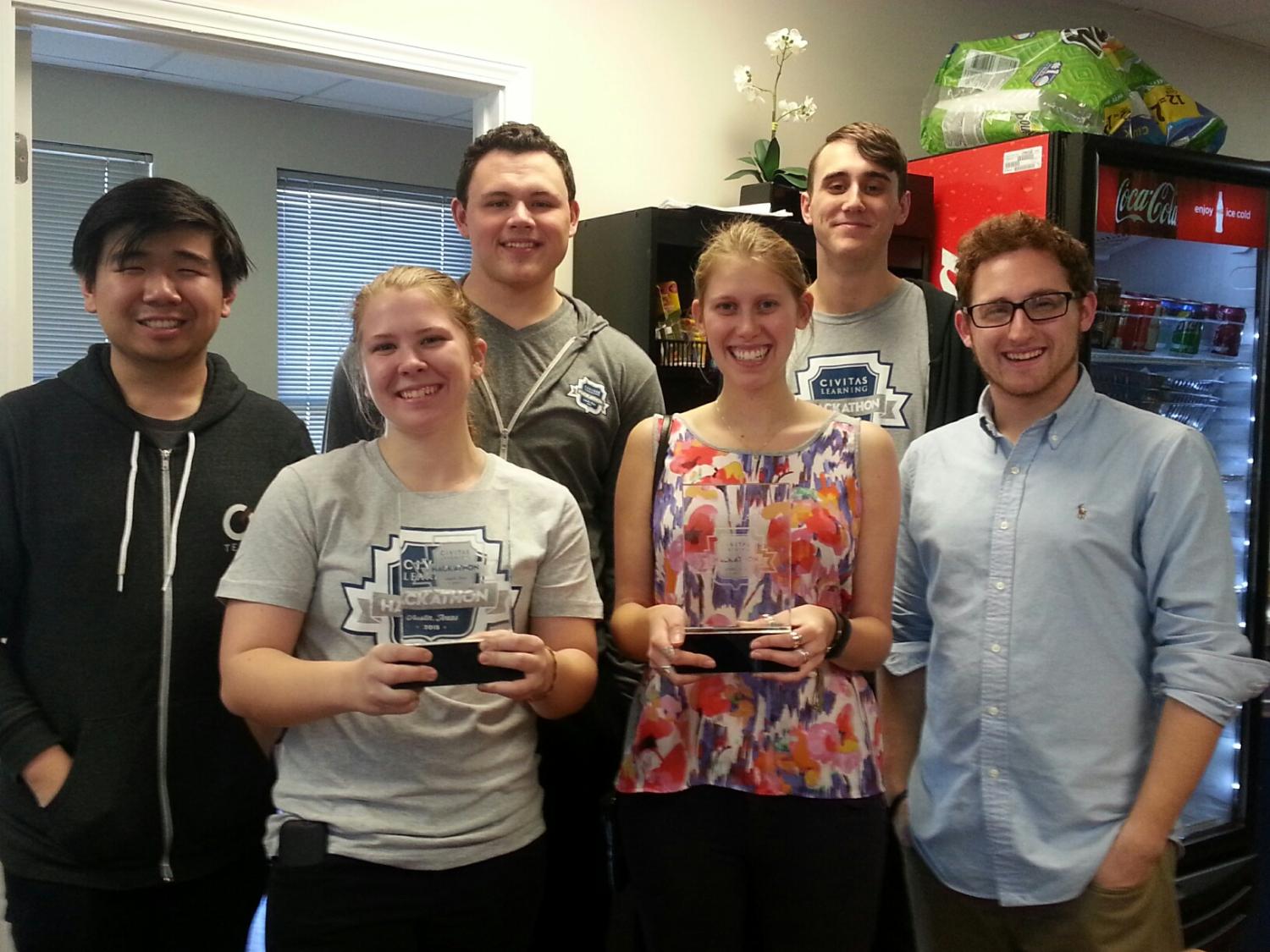 The six Penn State students holding their Civitas Hackathon prizes