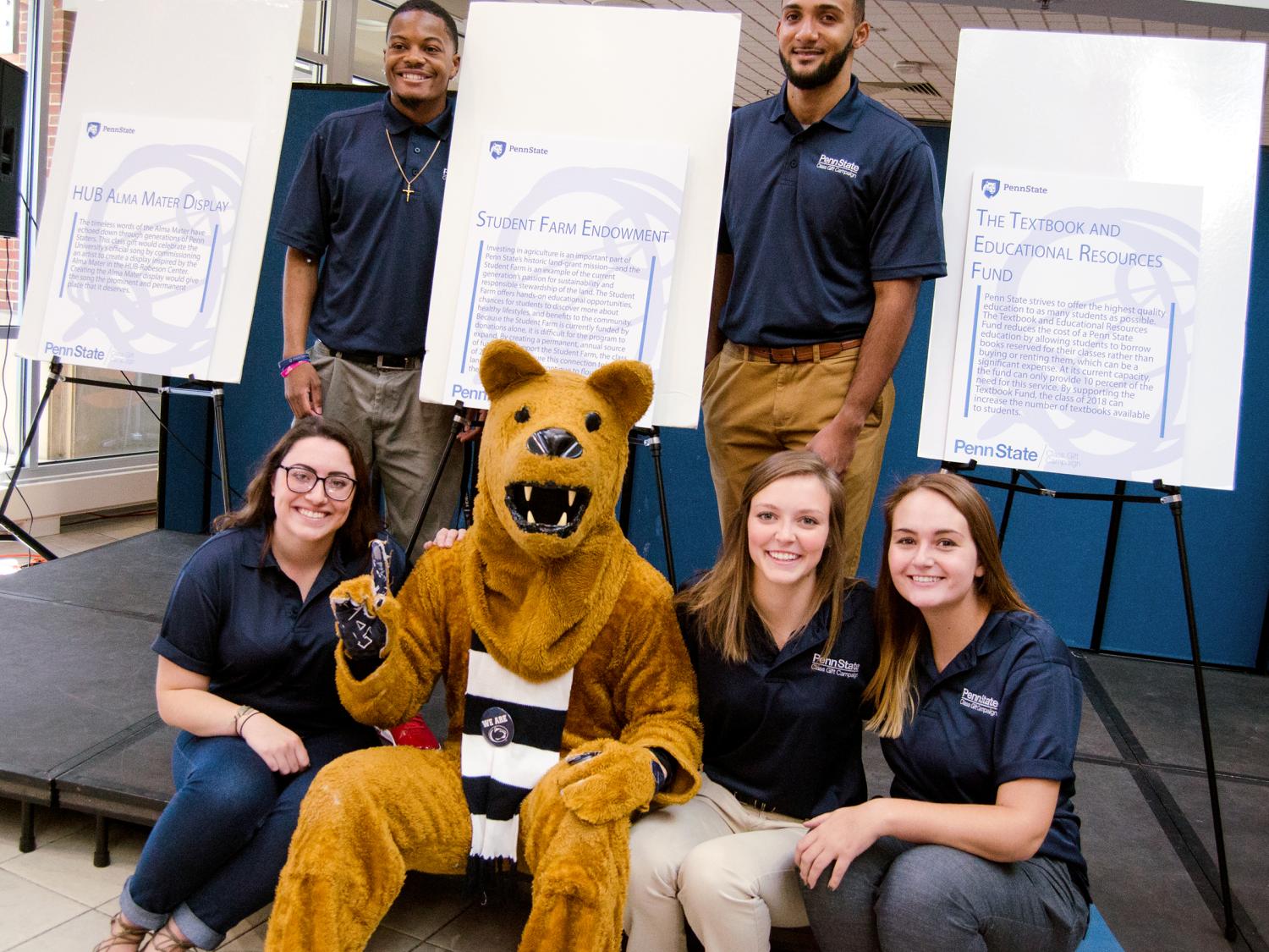 Students with the Nittany Lion mascot display the three 2018 class gifts.