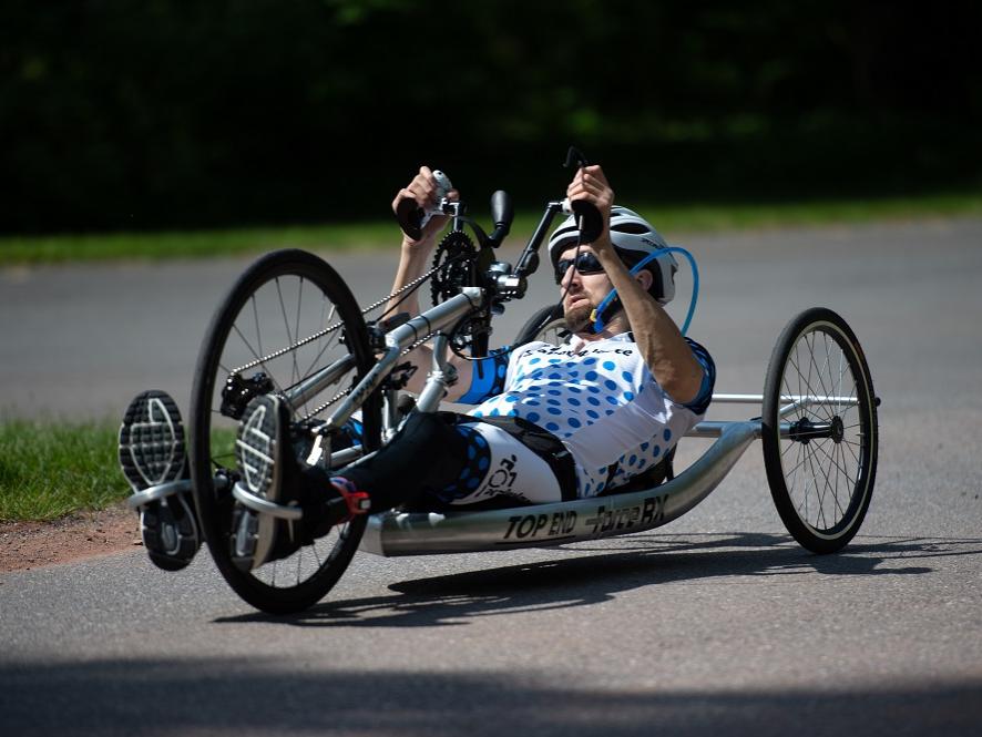 A man on an adapted bicycle