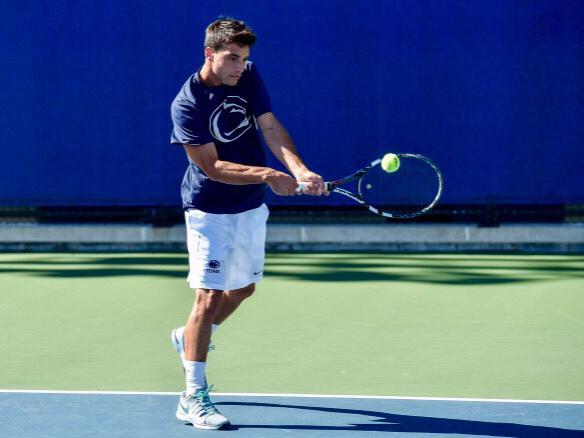 Marc Collado hits a tennis ball