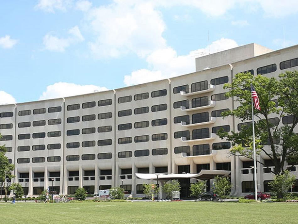 The building that houses Penn State's College of Medicine, a long crescent shaped building