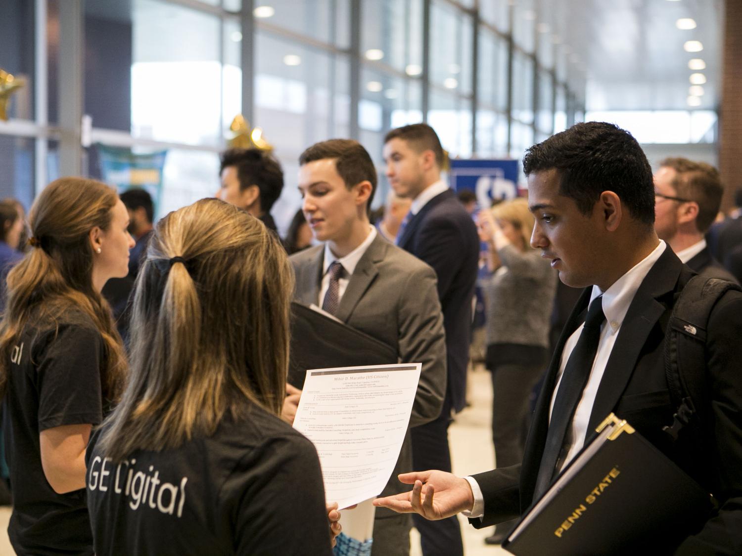 At the Future Expo career fair, recruiters with Corporate Associates engage with students.