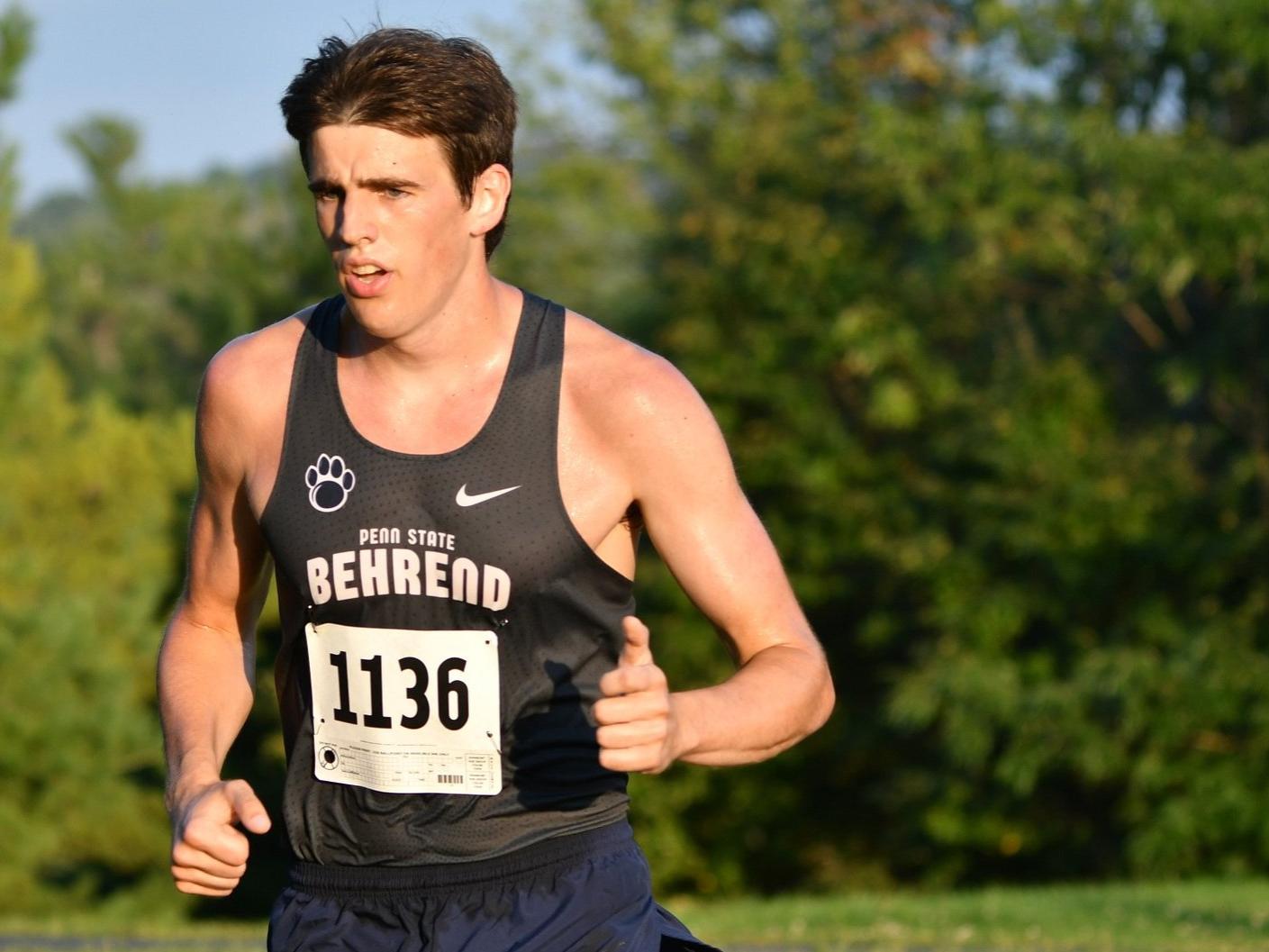 Penn State Behrend runner Phoenix Myers competes in an 8K race.