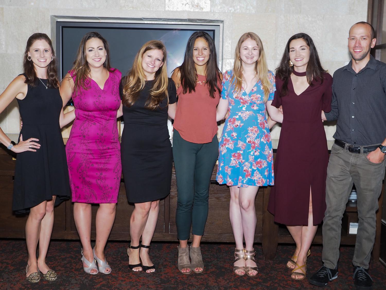 seven people gathered in restaurant