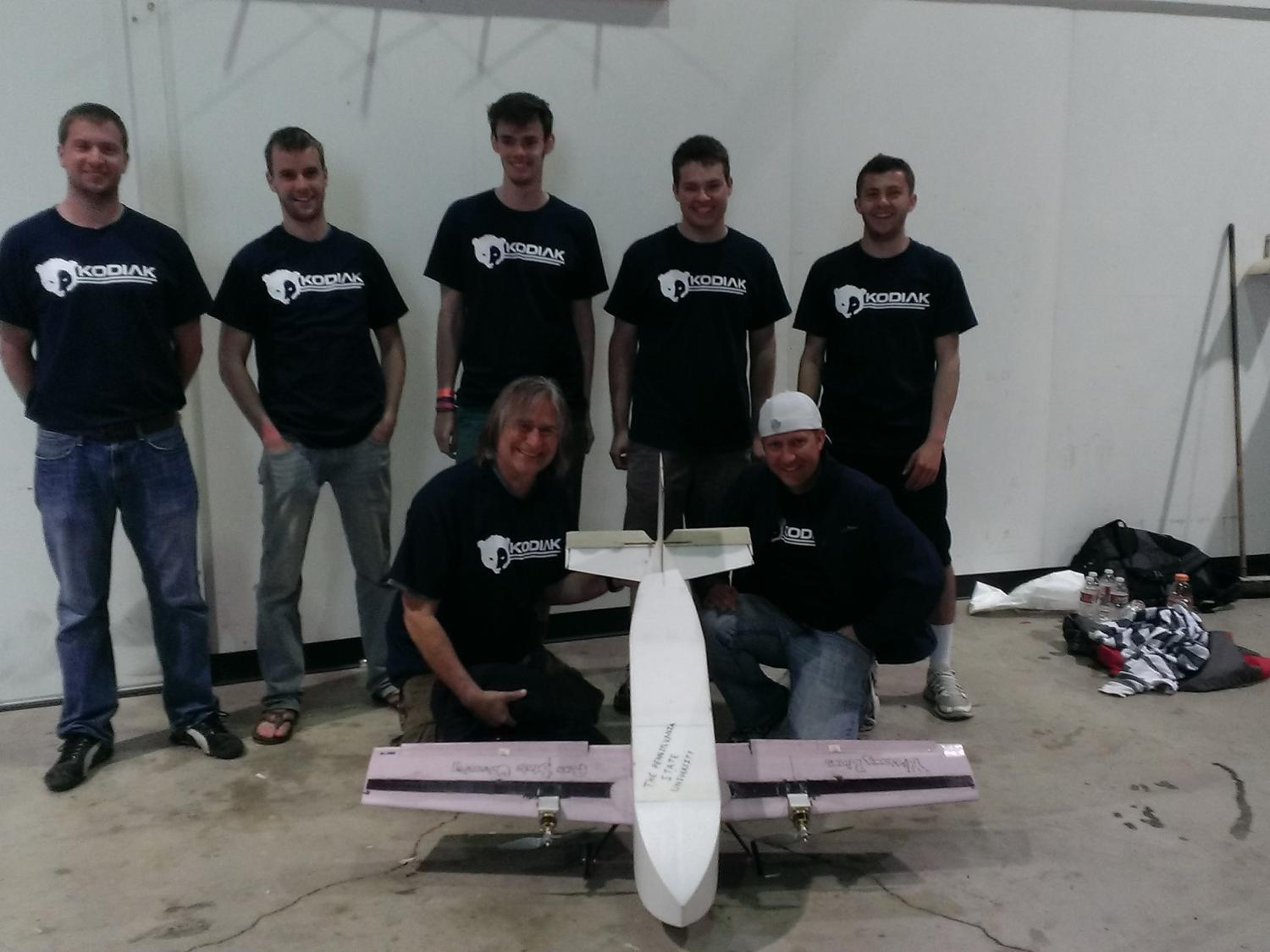 Penn State's AIAA Design/Build/Fly team poses with their craft
