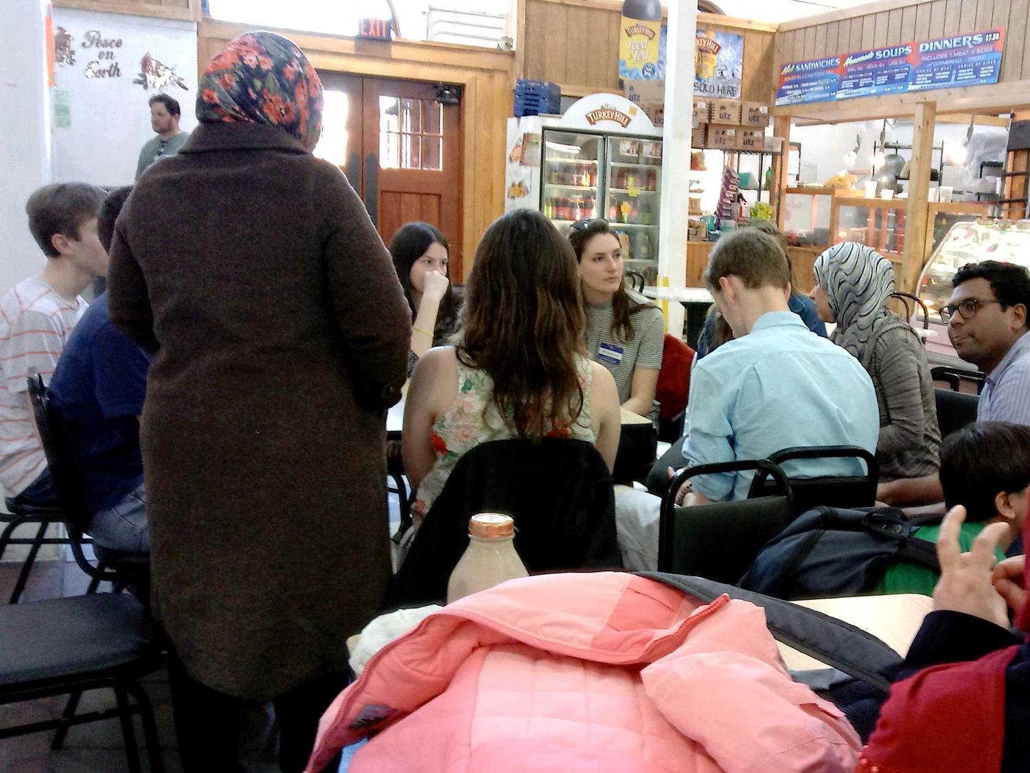 Penn State DHFP students visit with refugees