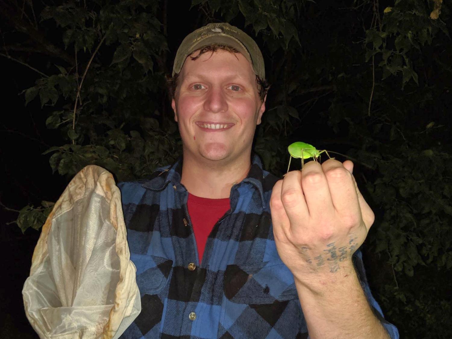 DJ McNeil with a katydid