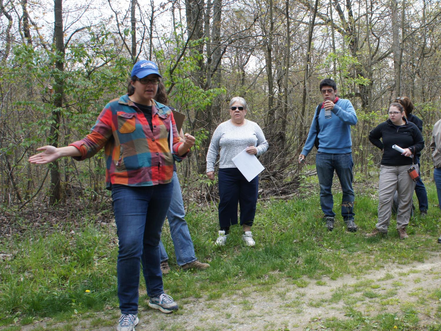 Penn State research Nooreen Meghani leads a field trip to an orphaned well site  