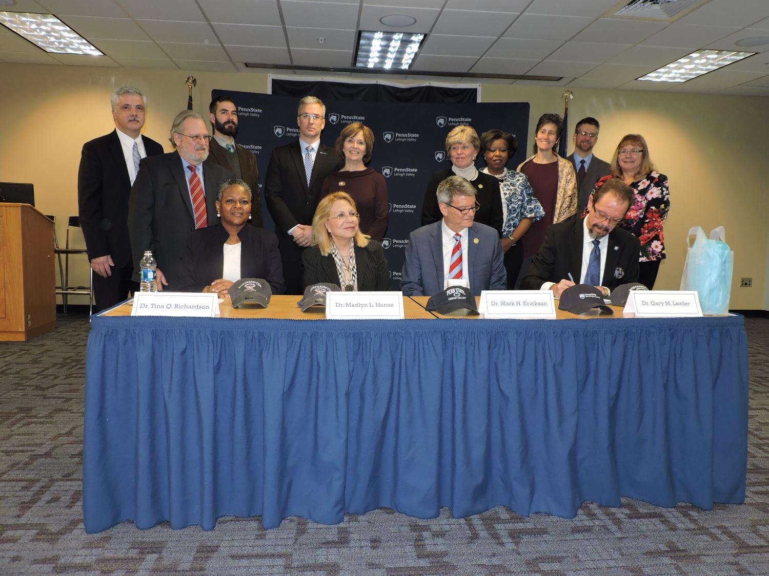 Administrators gather to sign articulation agreement