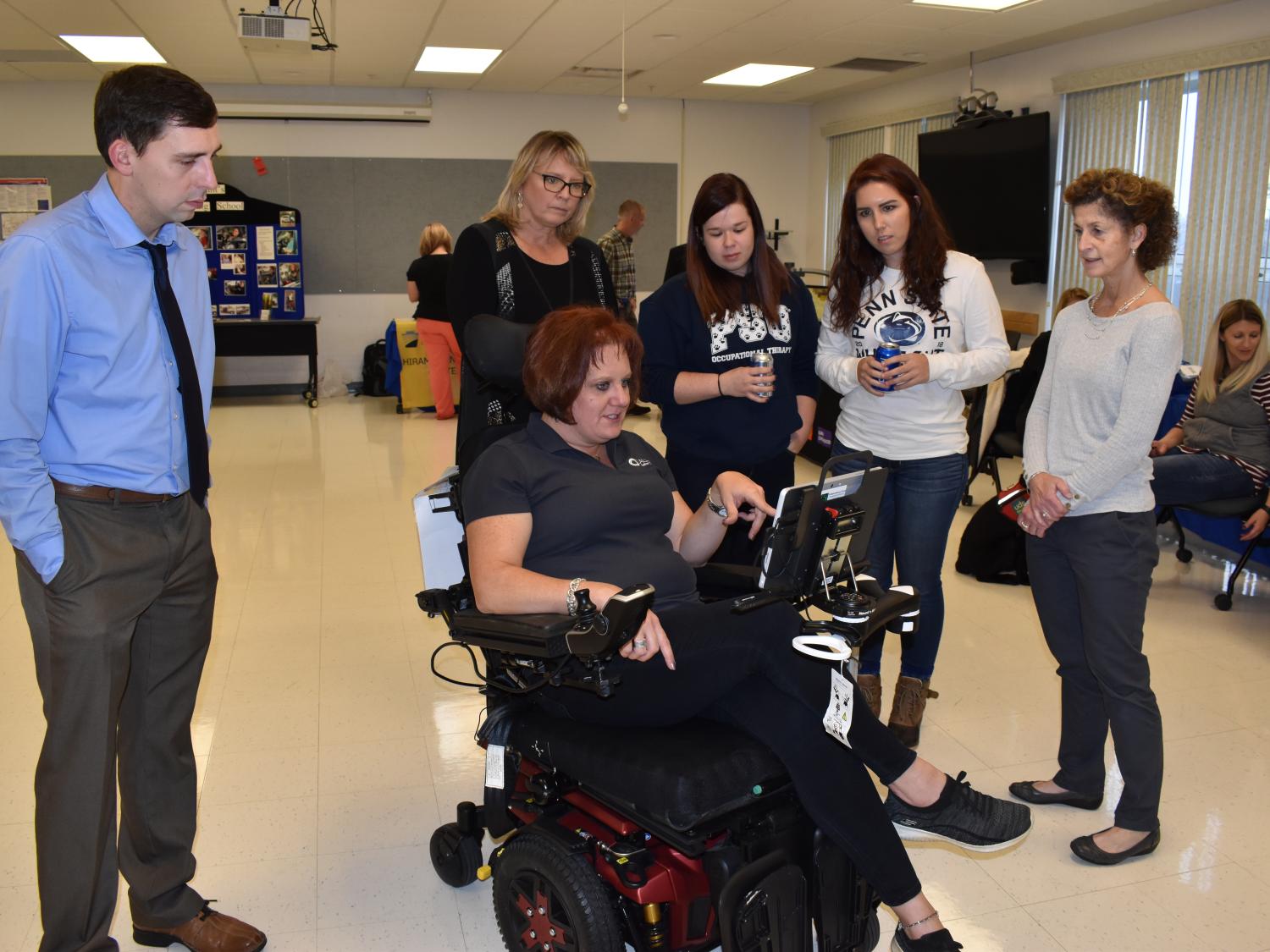 Melissa Davis from Laurel Medical Solutions demonstrates the use of a wheelchair equipped with Eye Gaze technology.