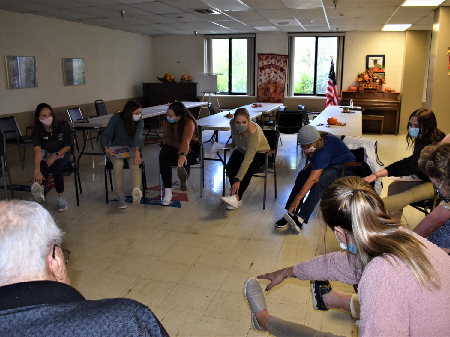 Penn State DuBois Occupational Therapy Assistant students lead area senior residents in fall prevention exercises.  