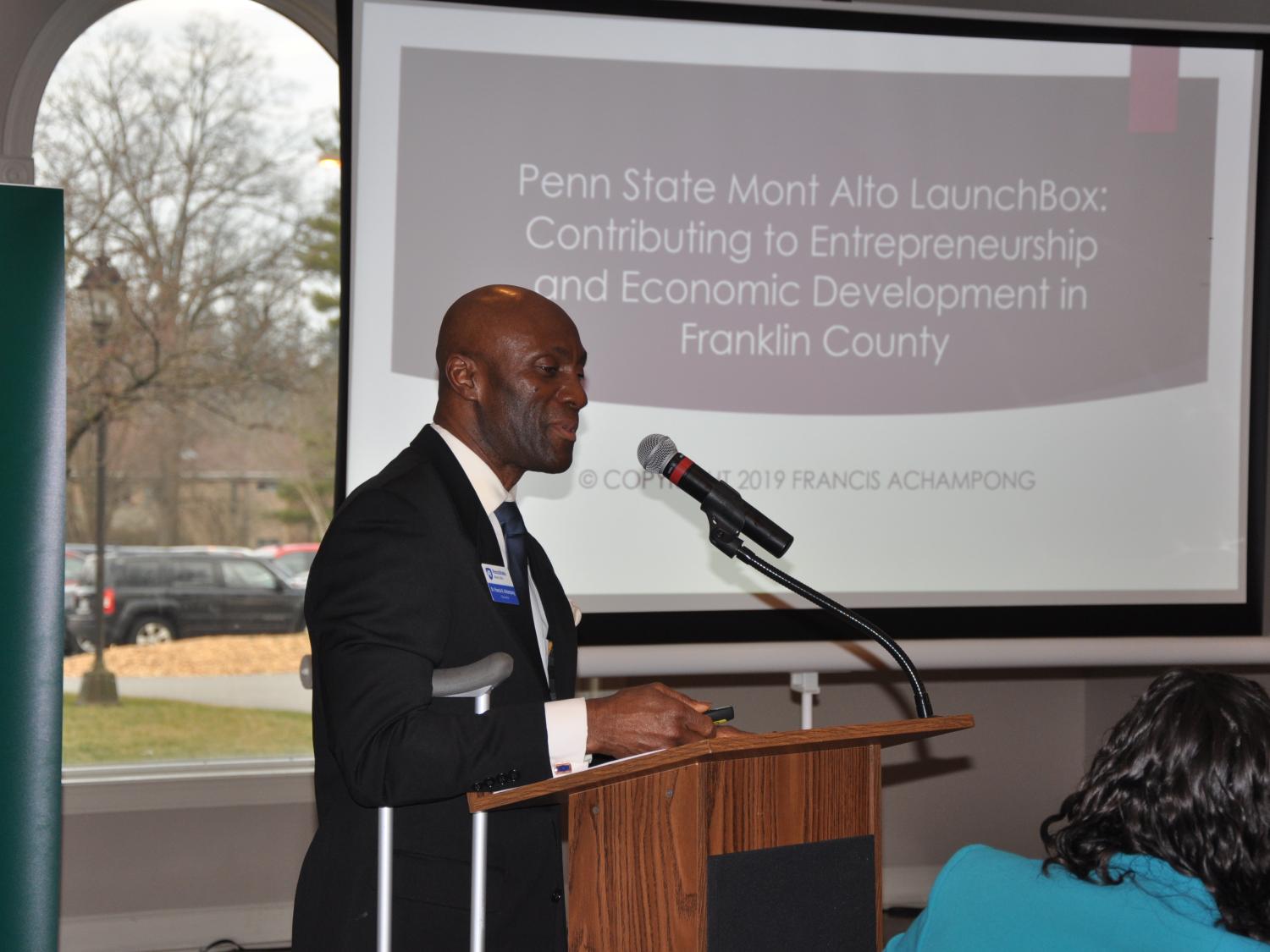Mont Alto Chancellor Achampong presents at podium