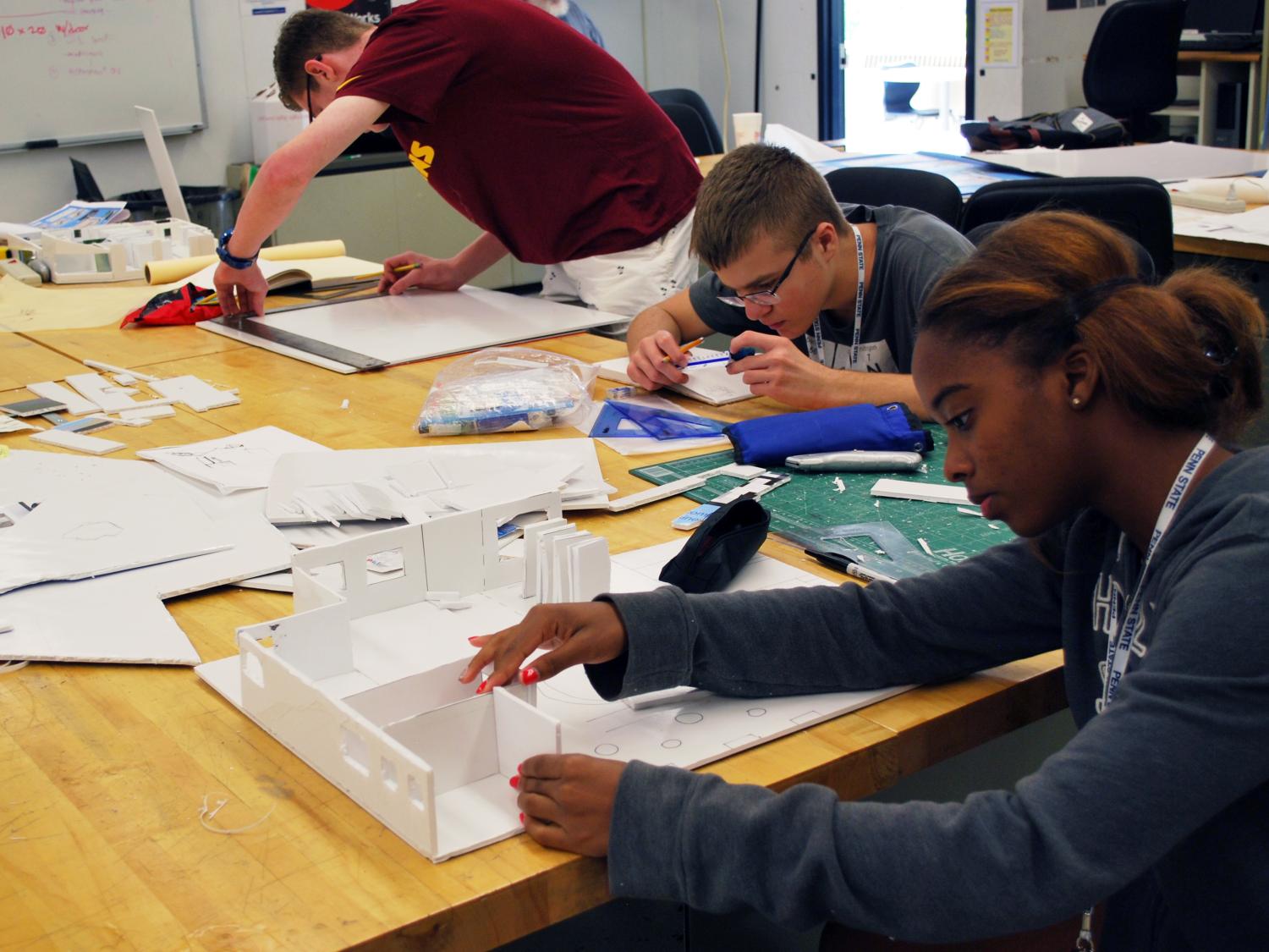 Summer study students working on project