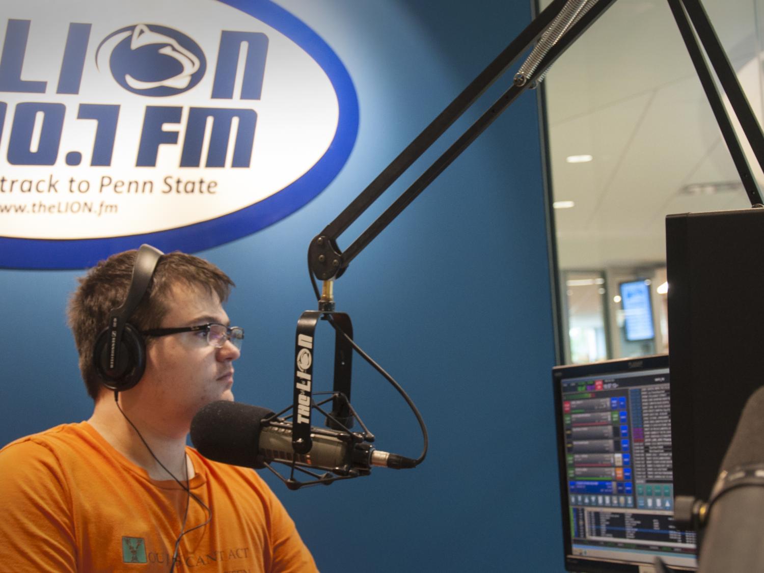 Alex Mellott at the Lion FM studio in the HUB