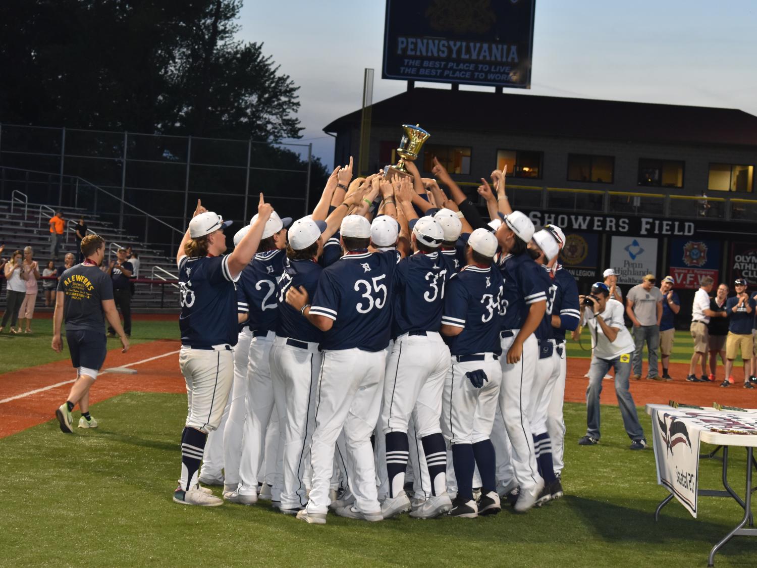 The Penn State DuBois Baseball Team hoists their championship trophy, celebrating the third USCAA World Series Victory for the team. 