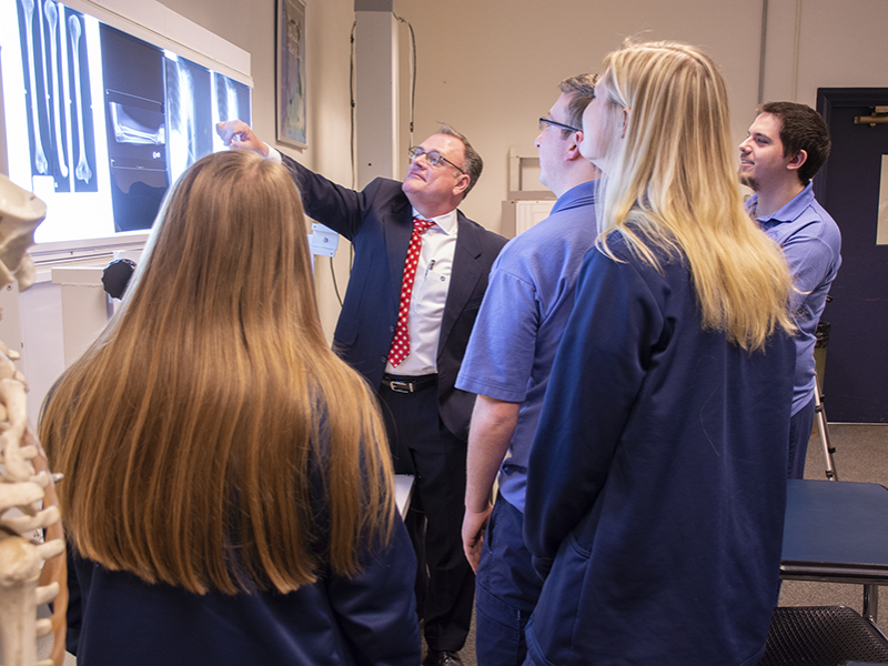 Schuylkill lecturer Tom Sandridge reviews x-rays with Radiological Sciences students.