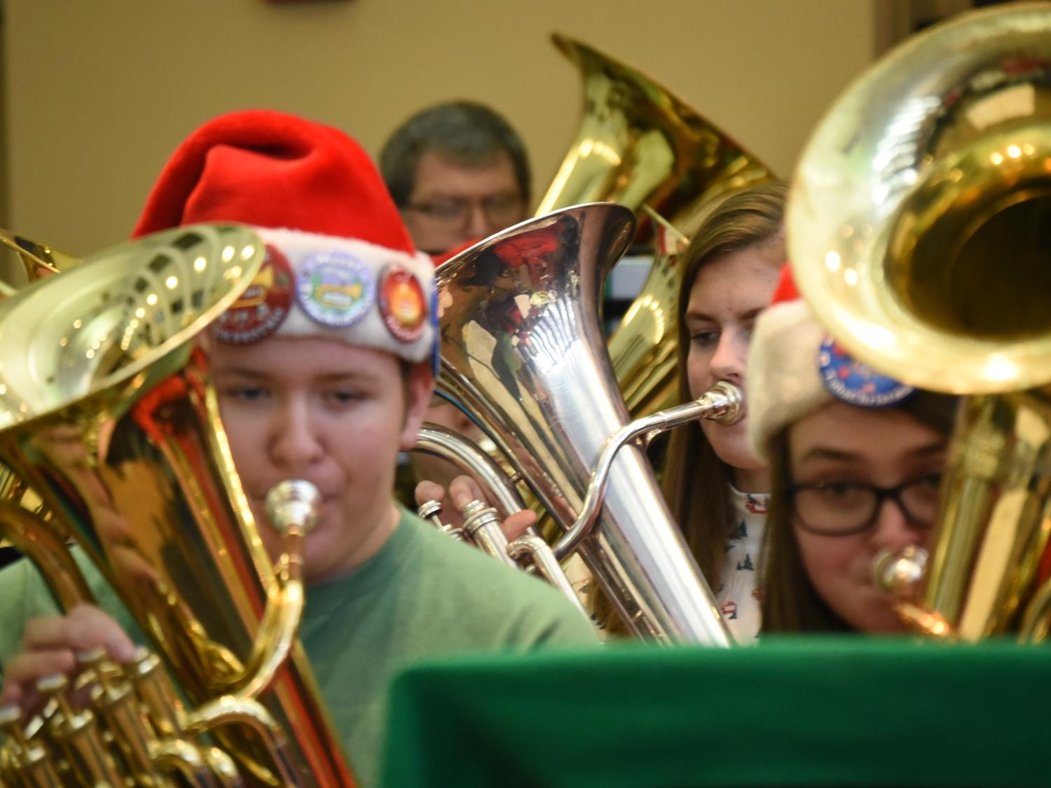 Tuba players perform Christmas standards at Penn State Behrend's annual Tuba Christmas concert.