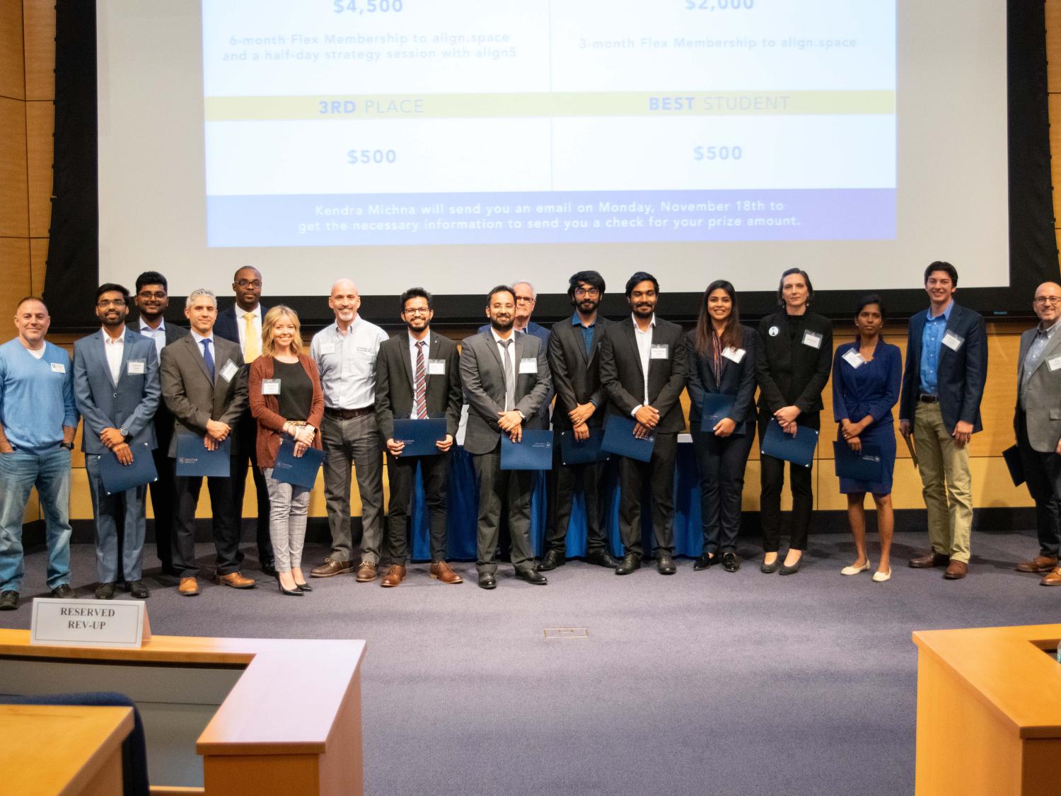 The 2019 Lion Cage presenters standing at the front of the auditorium