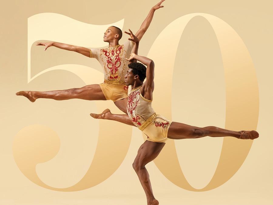 Two ballet dancers are frozen in position.