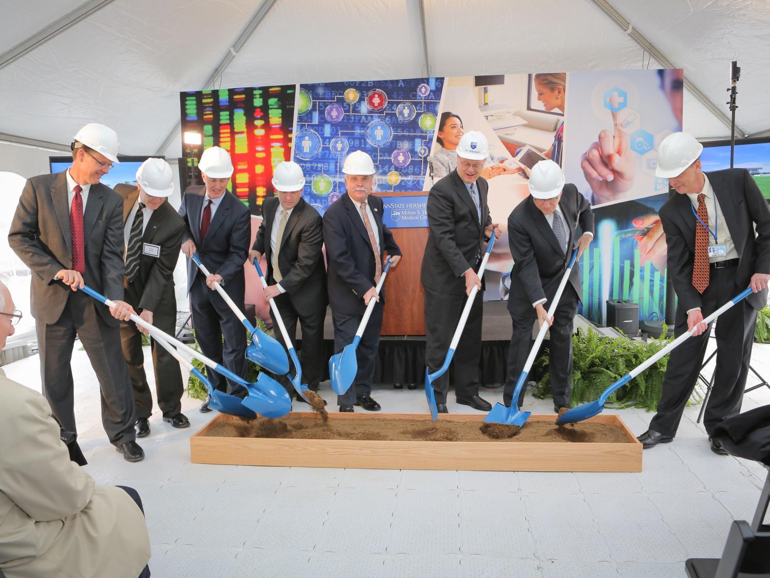 Dignitaries participate in a ceremonial groundbreaking for the new University Technology Center