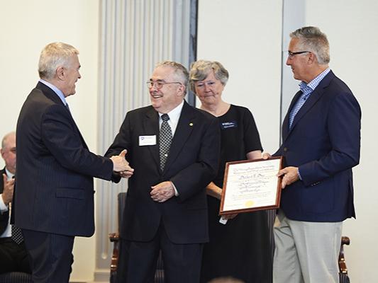 Delbert Day, inventor and materials scientist, accepts the Distinguished Alumni Award from Penn State