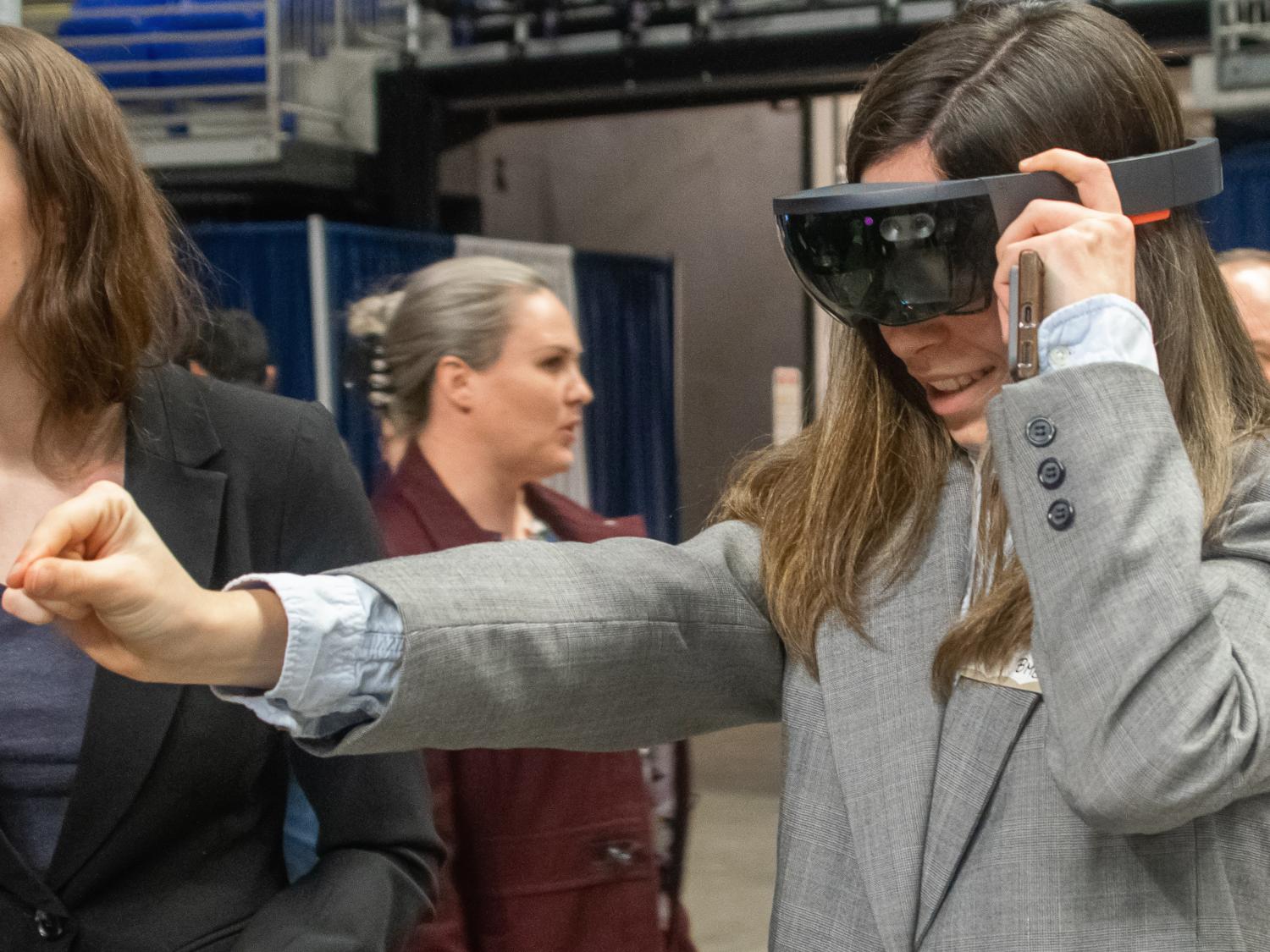 female student using VR googles 