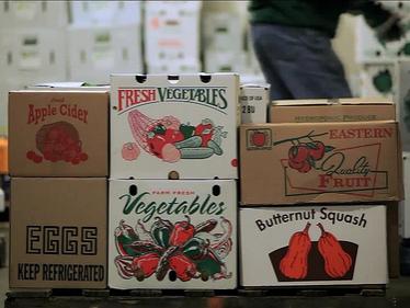 closed cartons of fresh produce and eggs