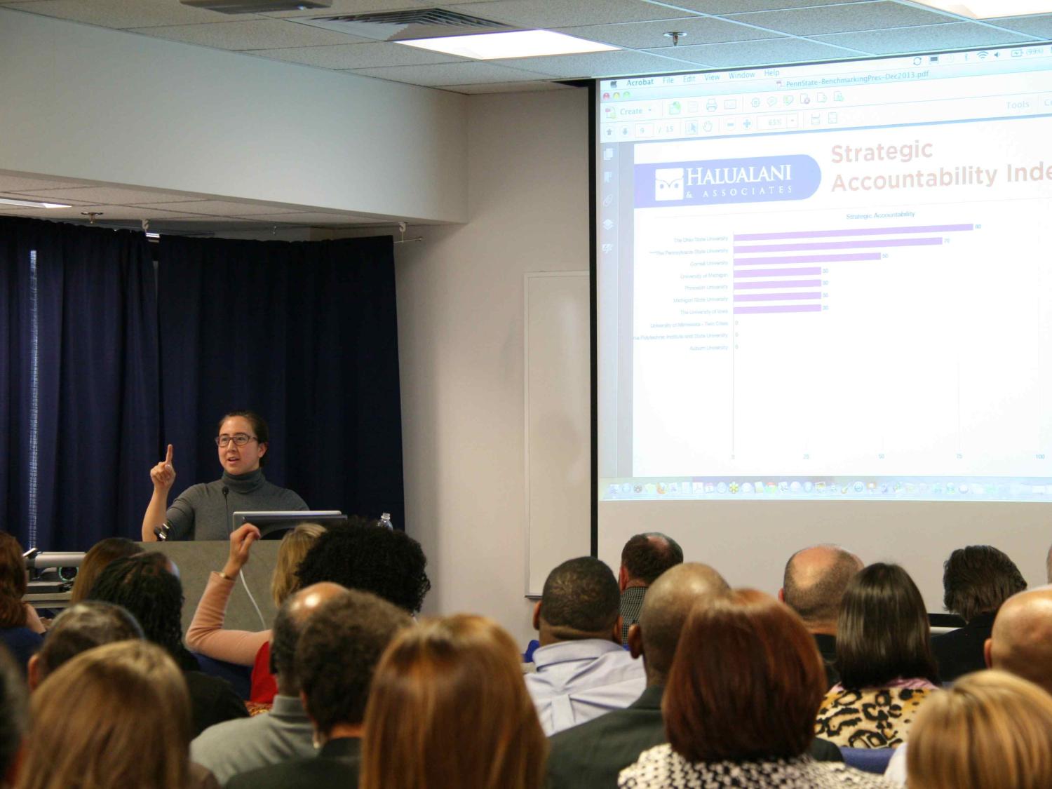 Researcher Rona Halualani speaks about Penn State's diversity and inclusion efforts while presenting a slideshow