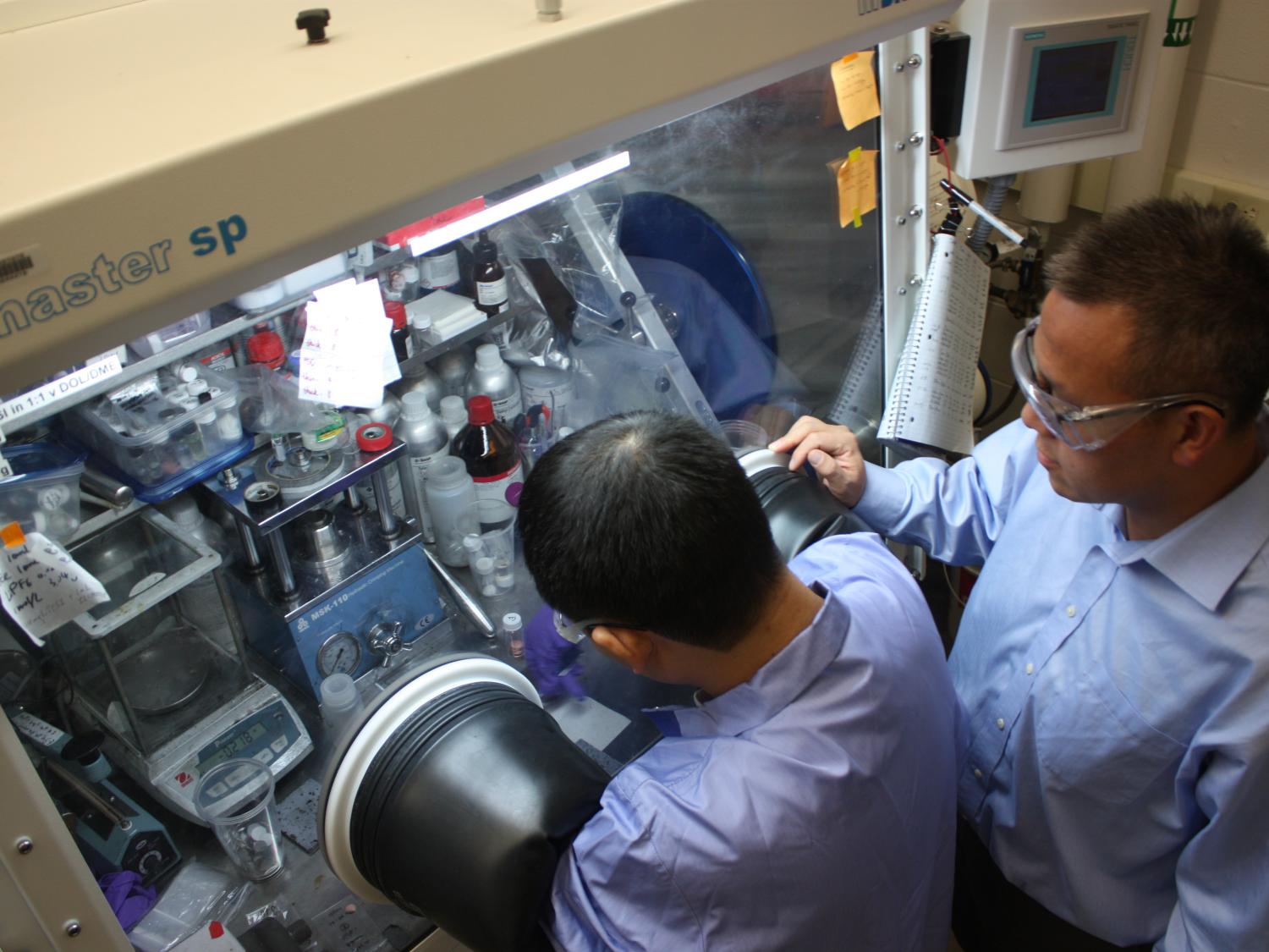Image of two men working in a laboratory.