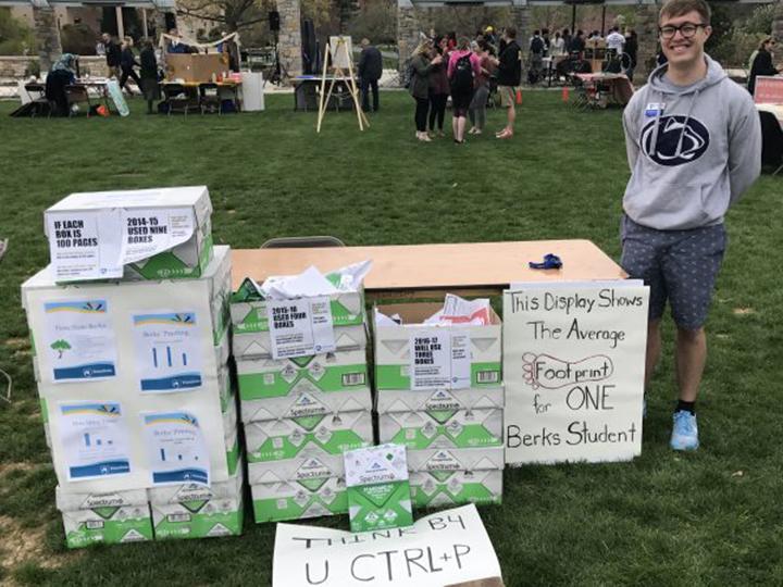 Earth Fest stations shows paper footprint of one student
