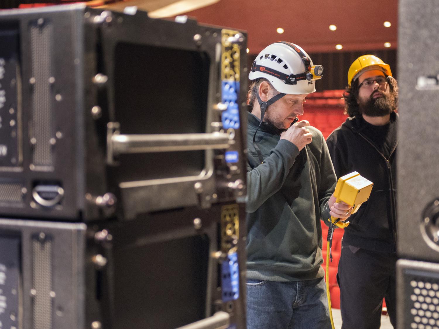 crew installing sound system