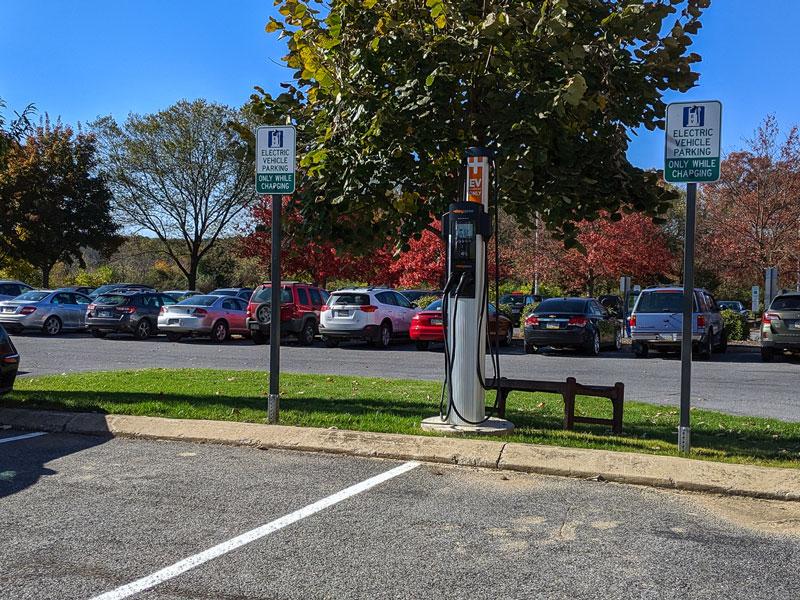 Parking lot with electric vehicle charging station