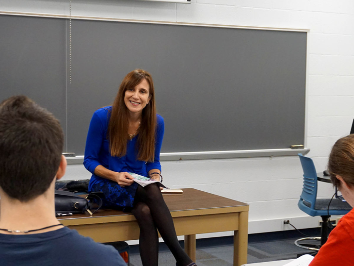 MaryEllen Higgins answers a student’s question in class. 