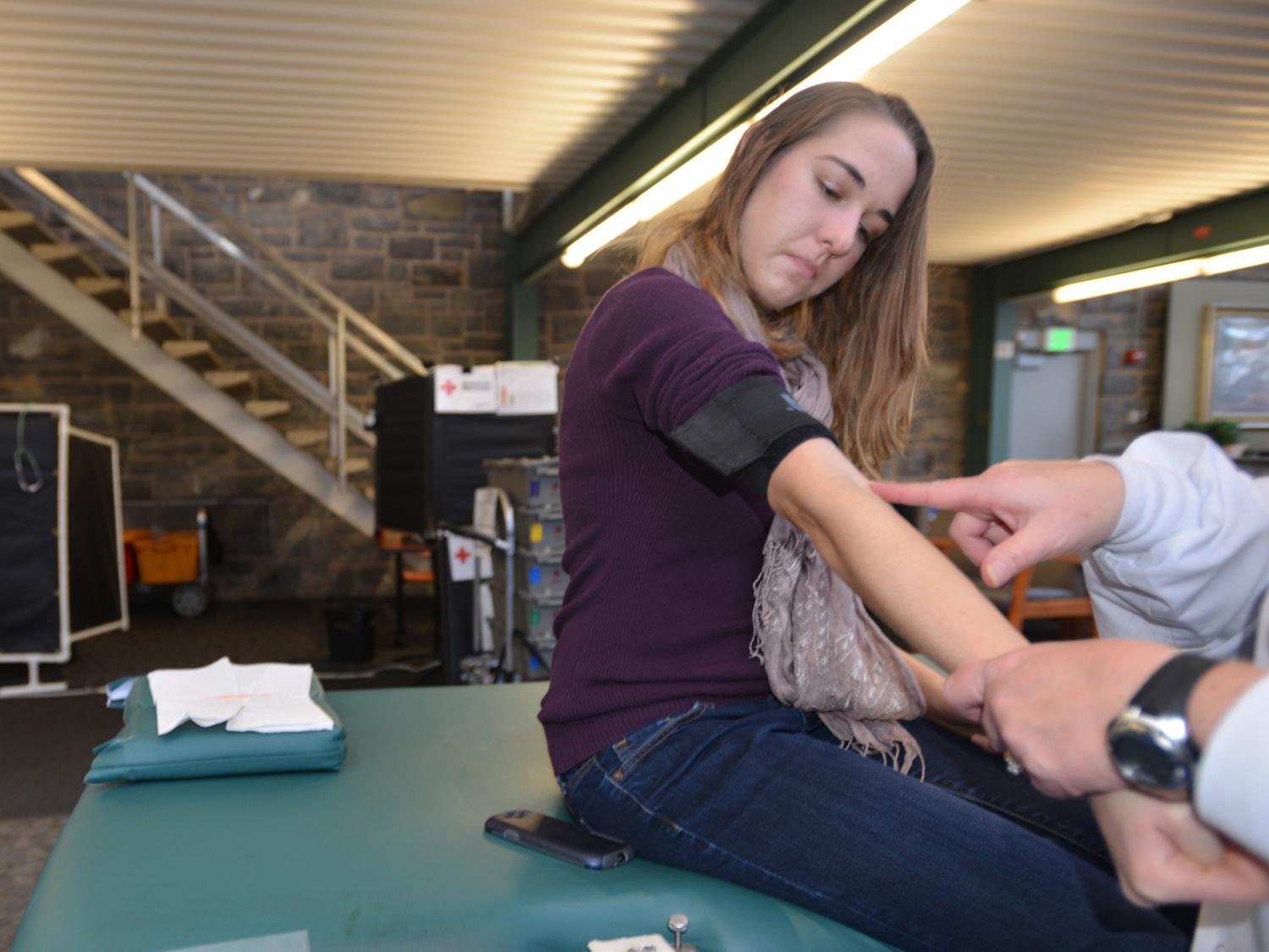 Erin Gaddes gives blood