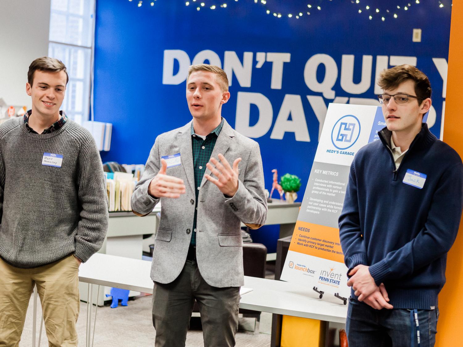 Three students presenting on Demo Day in 2019 in Happy Valley LaunchBox