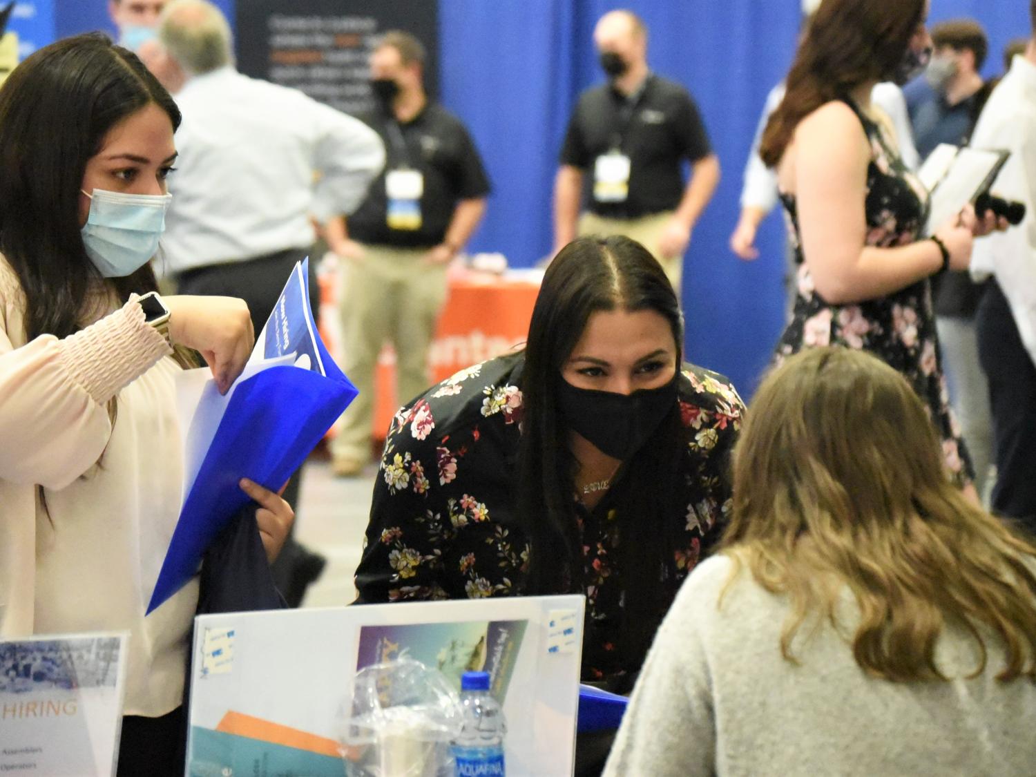 Students talk with a recruiter during the Penn State Behrend fall 2021 Career and Internship Fair.