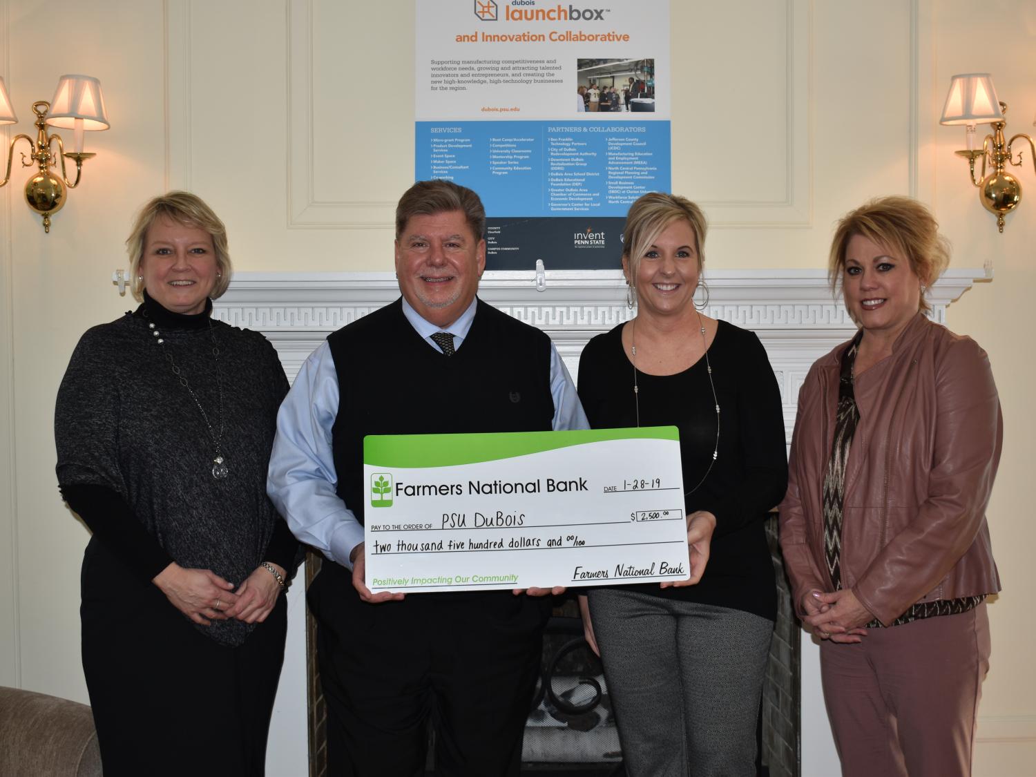 Left to right, Jean Wolf and Chancellor M. Scott McBride, Danyell Bundy and Kelli Allison.