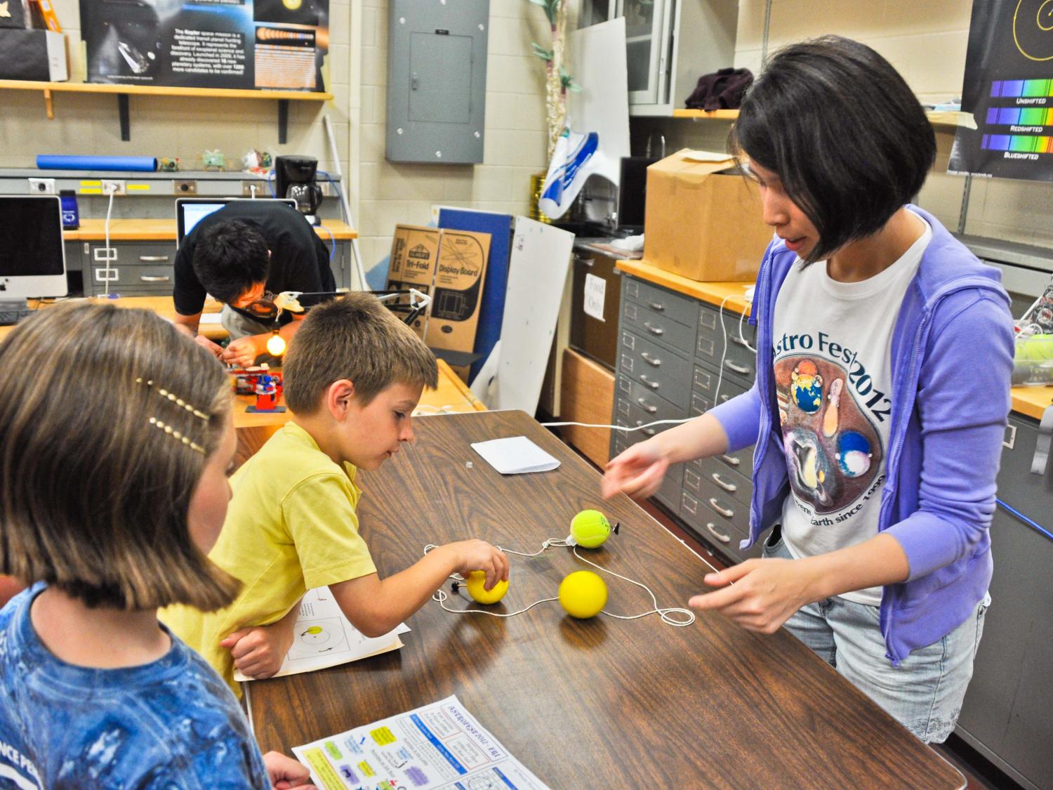 AstroFest visitors participate in craft activities.