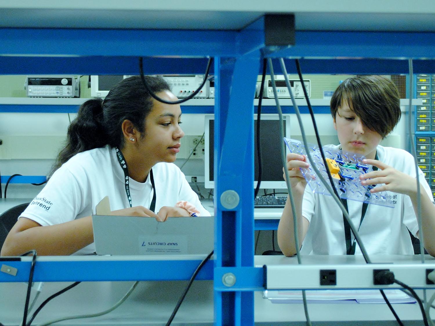 Students work in a circuits lab during the "GE Girls @ Penn State" camp