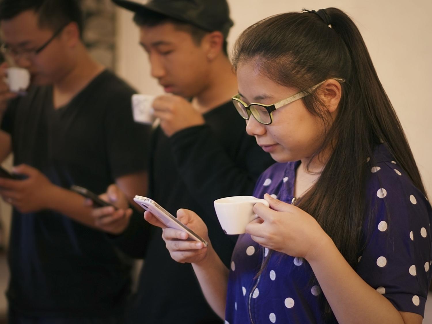 Employees at Analytical Flavor Systems tasting coffee 