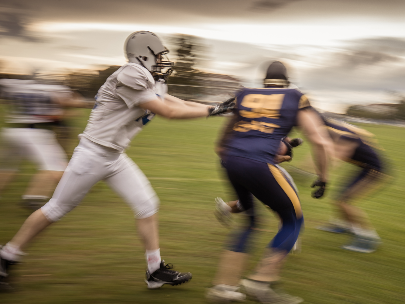 football players moving fast