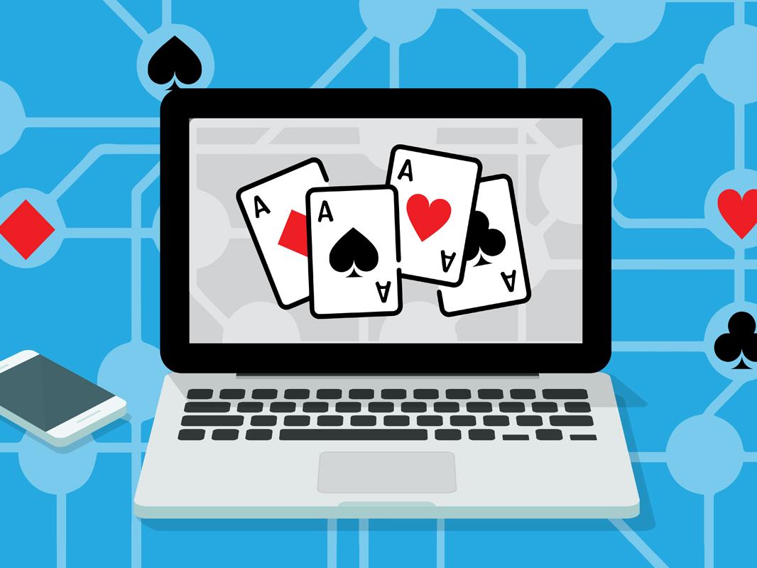 graphic of laptop with playing cards displayed on monitor