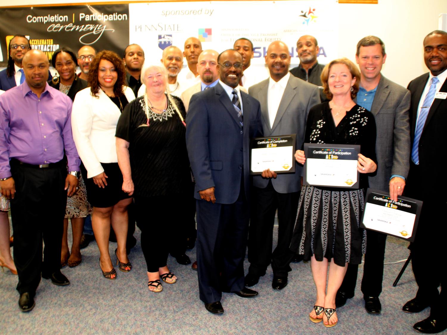 Group photo of ACT program graduations